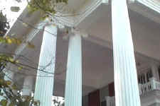 These Ionic Columns are pure wood and are the pride of the house. Notice the balcony, where General Esenhower gave a speech in July of 1947