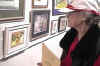 Lillian viewing her art at a show in Vicksburg, Ms. 