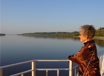 The placid waters of the Ms. River with Lillian in Natchez looking towards Vicksburg